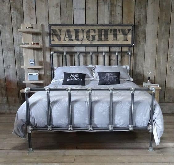 A Rustic Headboard Made from Metal Pipes