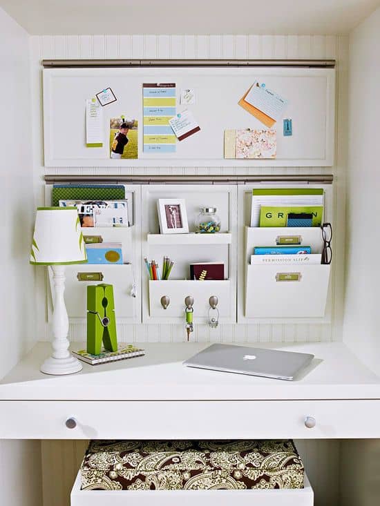 Hang a whiteboard on the wall to store and organize paperwork