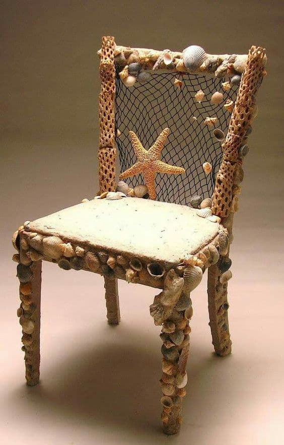 Homemade Chair with seashells and sand