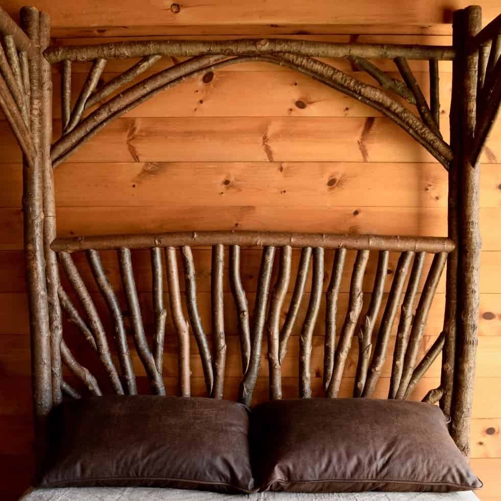 Rustic headboard made from branches