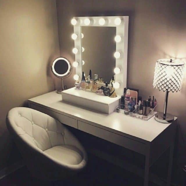 A Simple, Elegant Vanity Makeup Table With A Mirror And Storage