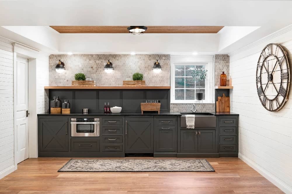 basement kitchen bar with plants and artwork