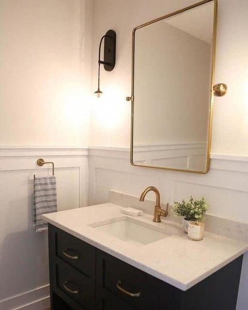 Guests Bathroom With Hanging Large Mirror