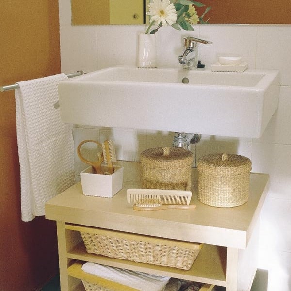 Store The Bathroom Supplies On The Wicker Baskets